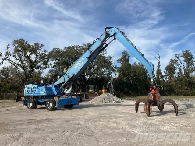 Fuchs MHL340 Stroje pre manipuláciu s odpadom