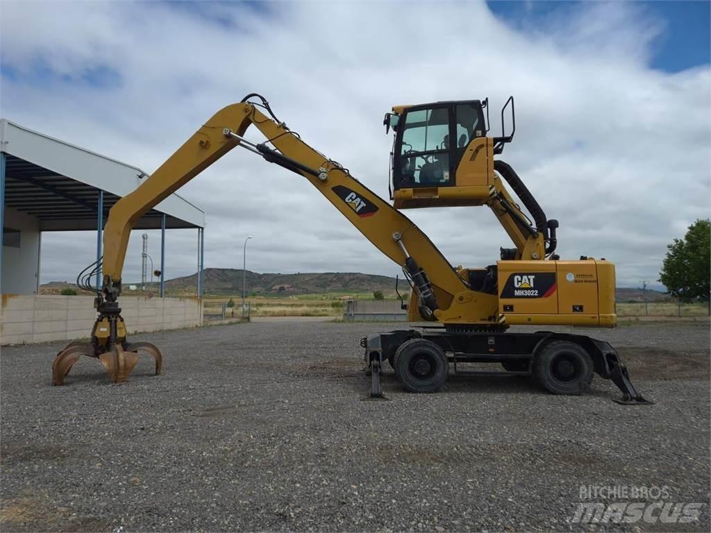 CAT MH3022 Kolesové rýpadlá