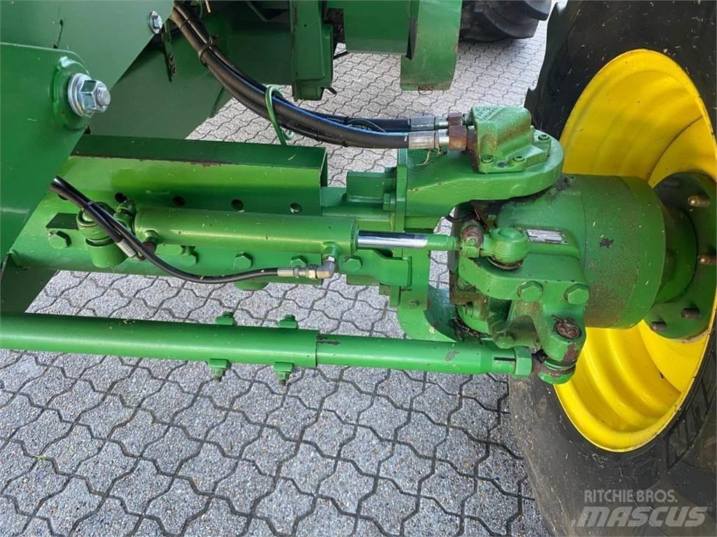 John Deere C670 Kombinované zberacie stroje