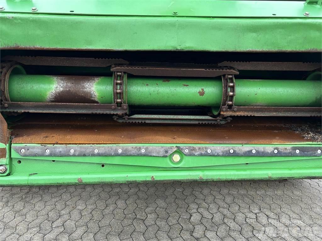 John Deere T670 Kombinované zberacie stroje