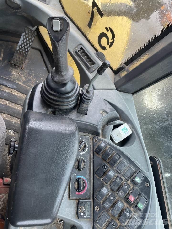 New Holland W190B Kolesové nakladače