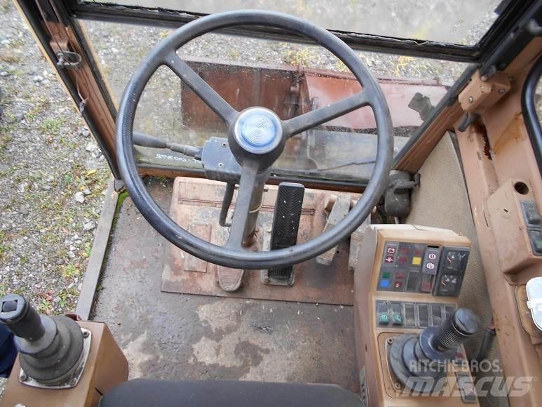 CAT 212B FT Kolesové rýpadlá