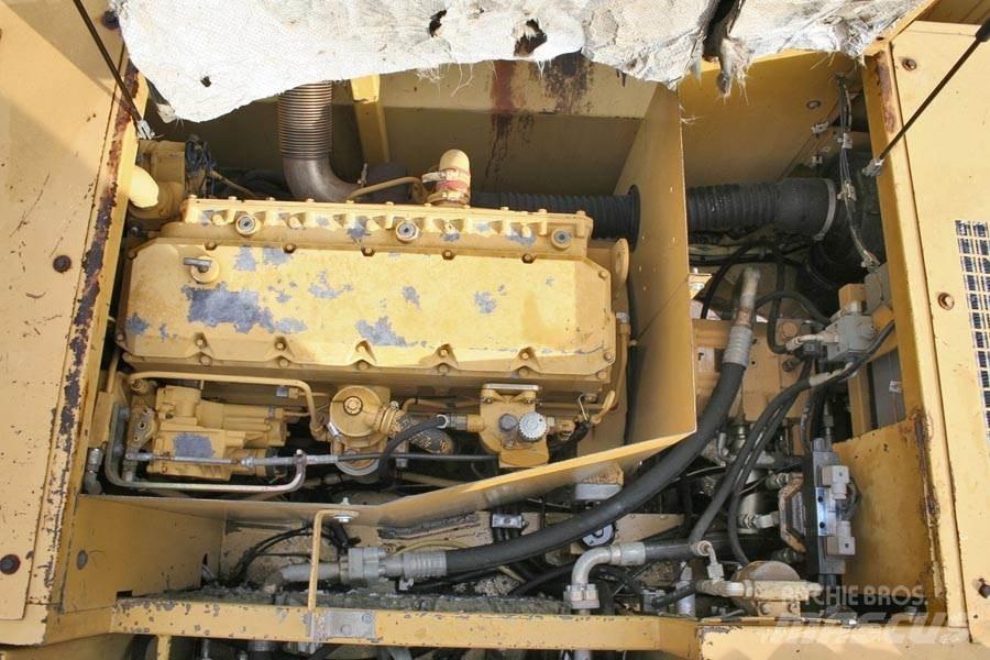 CAT 214B Kolesové rýpadlá