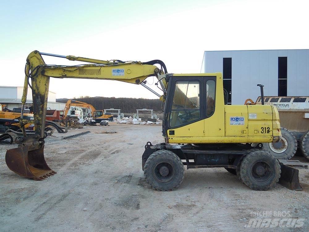 CAT M312 Kolesové rýpadlá