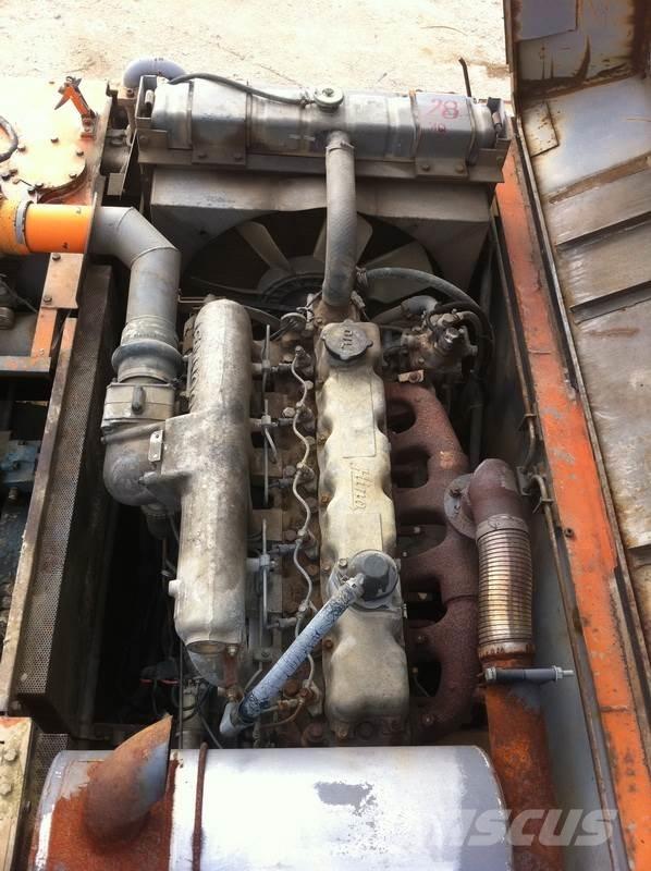 Hitachi UH 103 Pásové rýpadlá