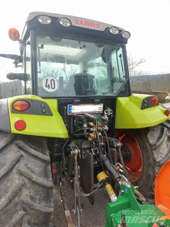 CLAAS Axos 330 CX Traktory