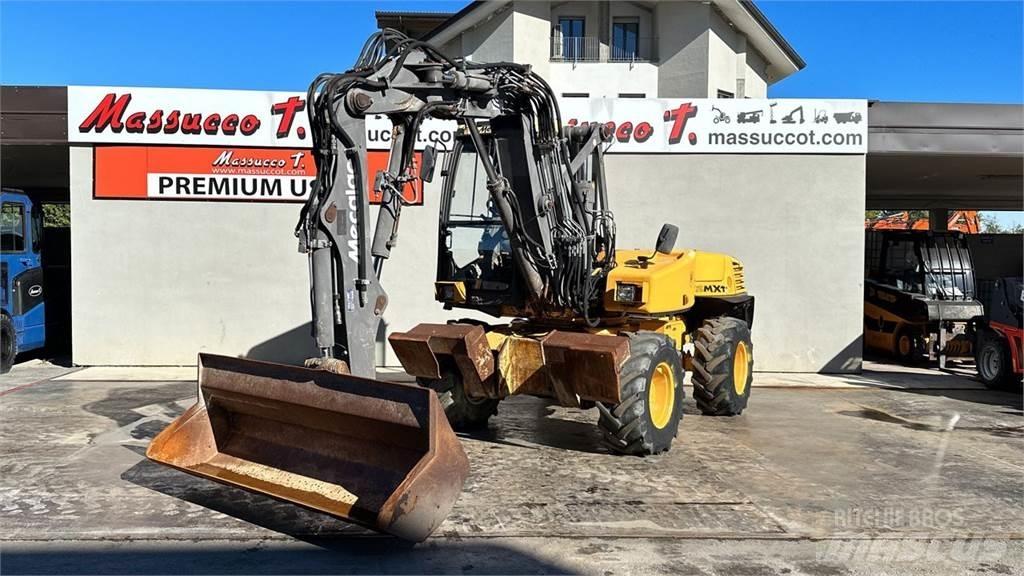 Mecalac 12MXT - E Kolesové rýpadlá