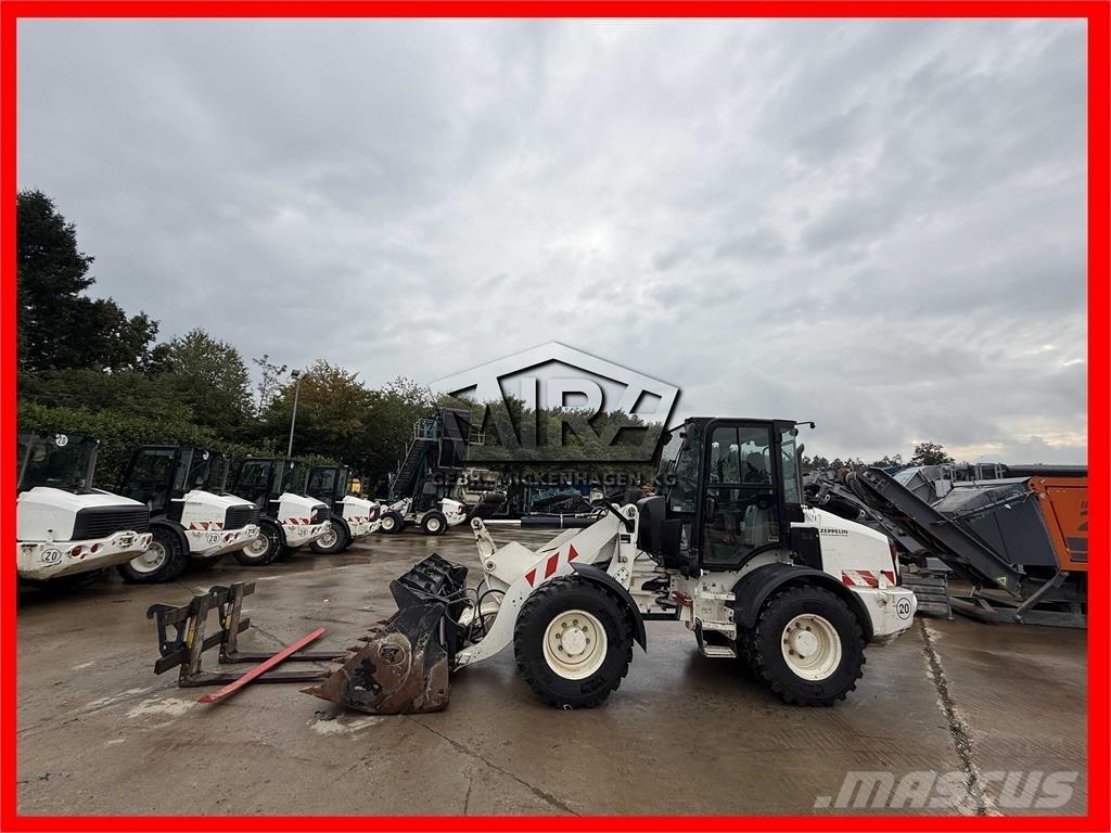 CAT 908M Kolesové nakladače