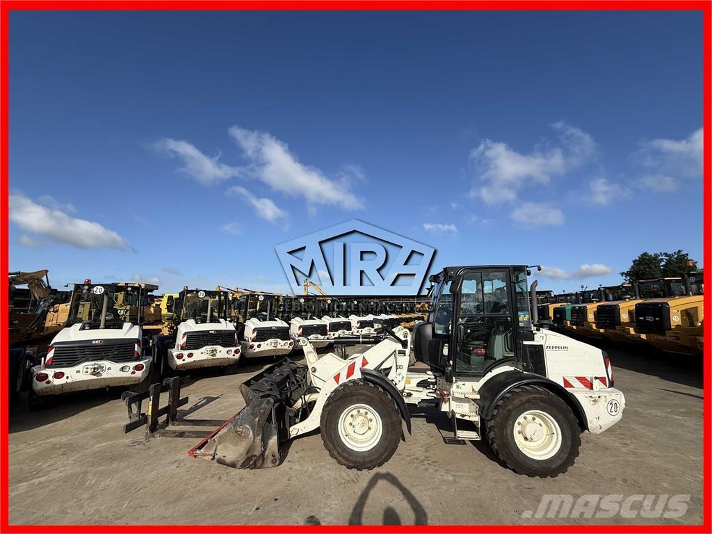 CAT 908M Kolesové nakladače