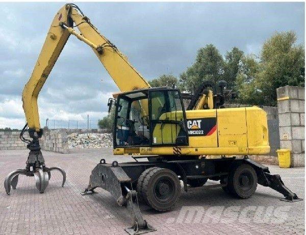 CAT 3022 Kolesové rýpadlá