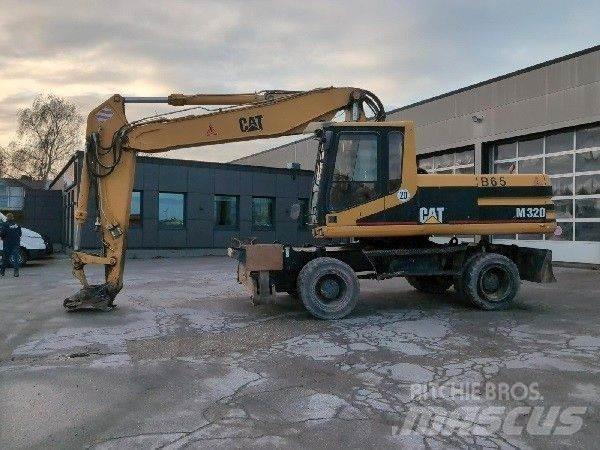 CAT M320 Kolesové rýpadlá