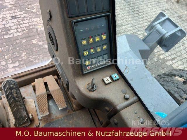 Fuchs MHL 350 Kolesové rýpadlá