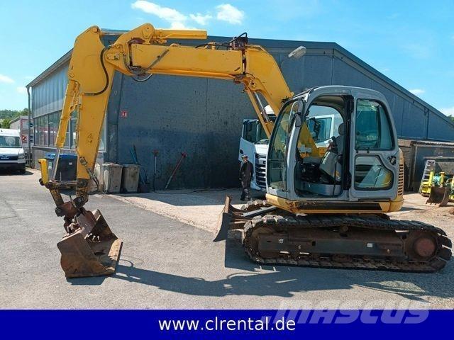 New Holland E70SR 4 Pásové rýpadlá