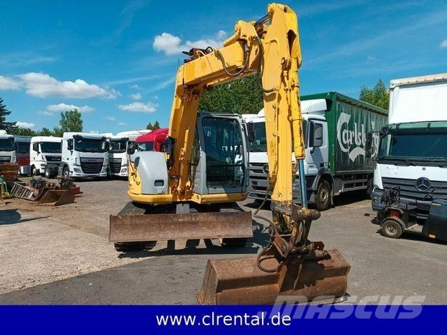New Holland E70SR 4 Pásové rýpadlá