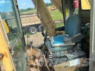 CAT 245 Pásové rýpadlá