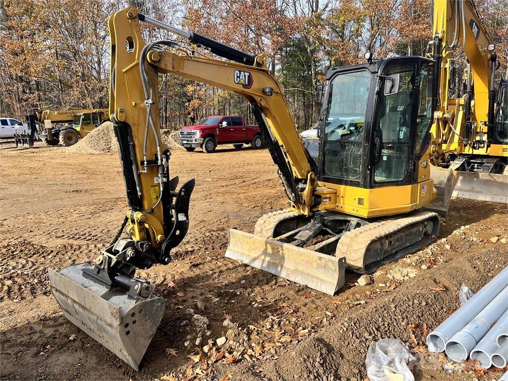 CAT 304 Pásové rýpadlá