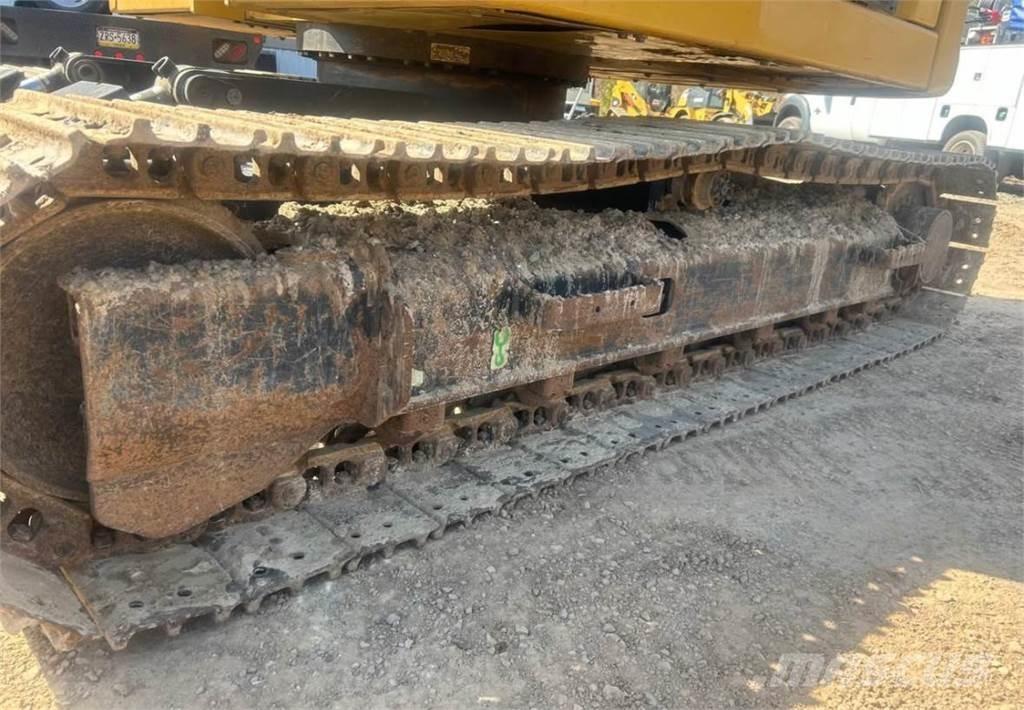 CAT 310 Pásové rýpadlá