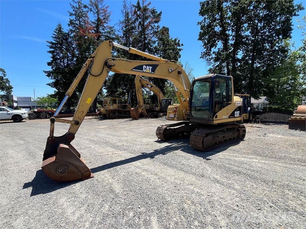 CAT 311C Pásové rýpadlá