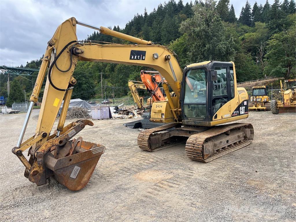 CAT 311C Pásové rýpadlá