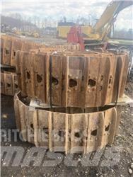 CAT 325 Pásy, reťaze a podvozok