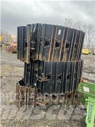 CAT 325 Pásy, reťaze a podvozok