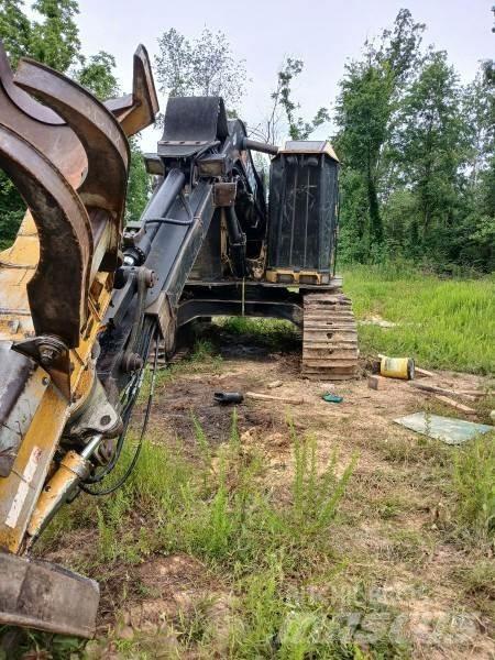 CAT 521 Stínacie harvestory