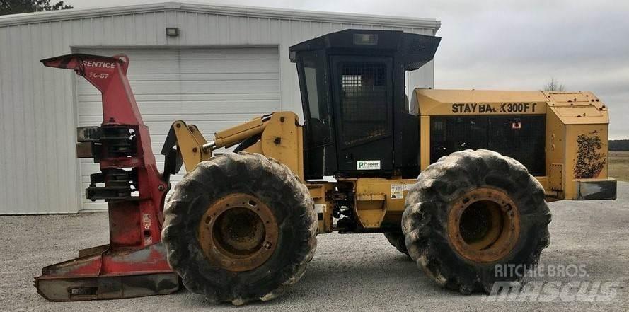 CAT 573C Stínacie harvestory