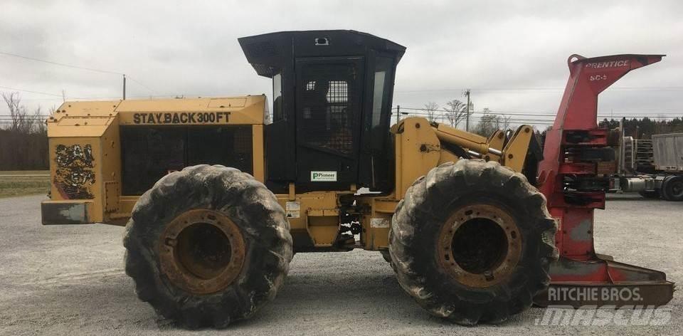 CAT 573C Stínacie harvestory