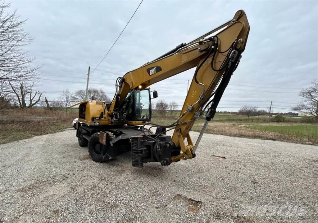 CAT M313D Kolesové rýpadlá