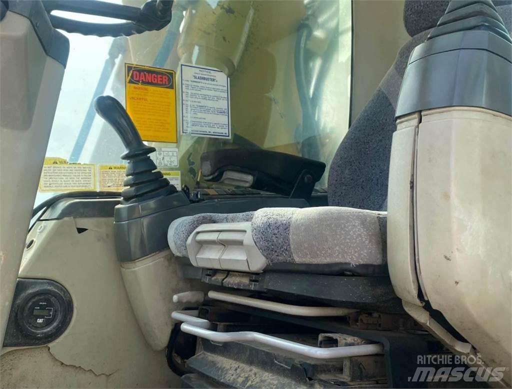 CAT M316C Kolesové rýpadlá