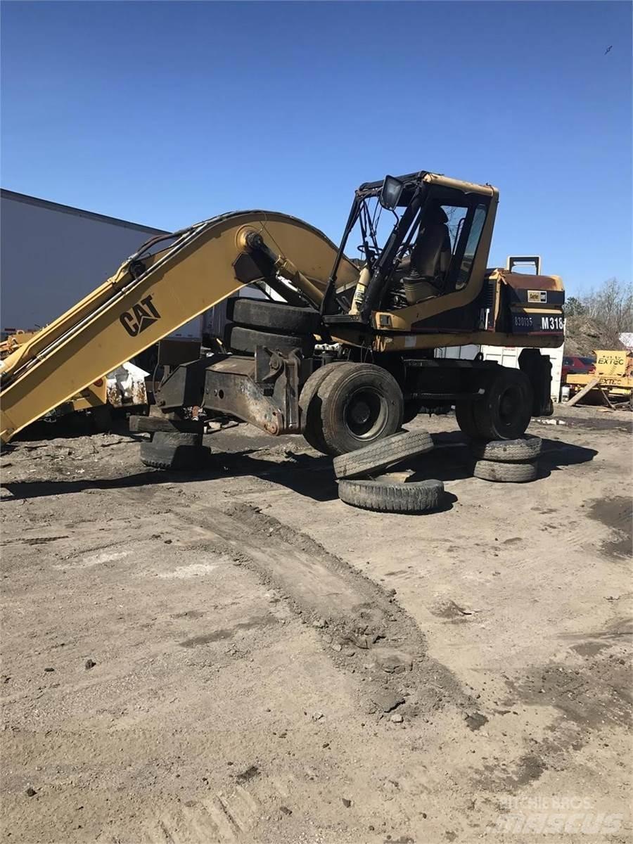 CAT M318 Kolesové rýpadlá