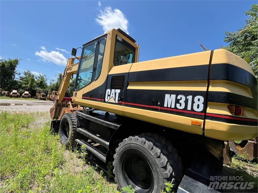 CAT M318 Kolesové rýpadlá