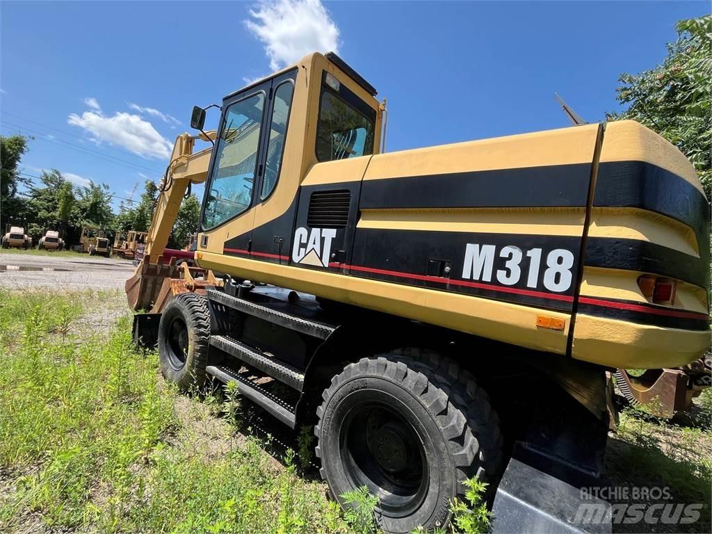 CAT M318 Kolesové rýpadlá
