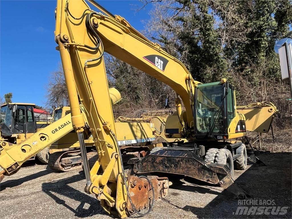 CAT M318C Kolesové rýpadlá