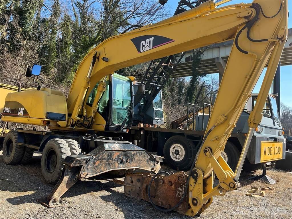 CAT M318C Kolesové rýpadlá