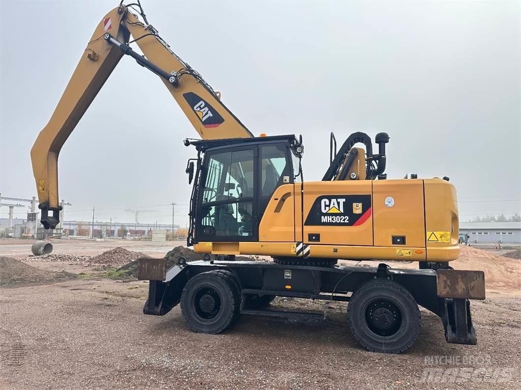 CAT MH3022 Kolesové rýpadlá