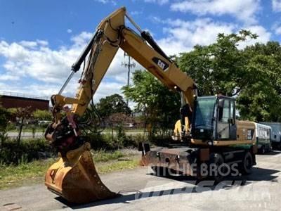 CAT M322D Kolesové rýpadlá