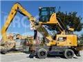 CAT MH3024 Stroje pre manipuláciu s odpadom