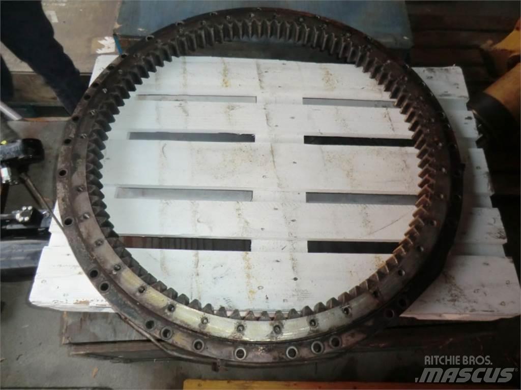CAT 231D Podvozky a zavesenie kolies