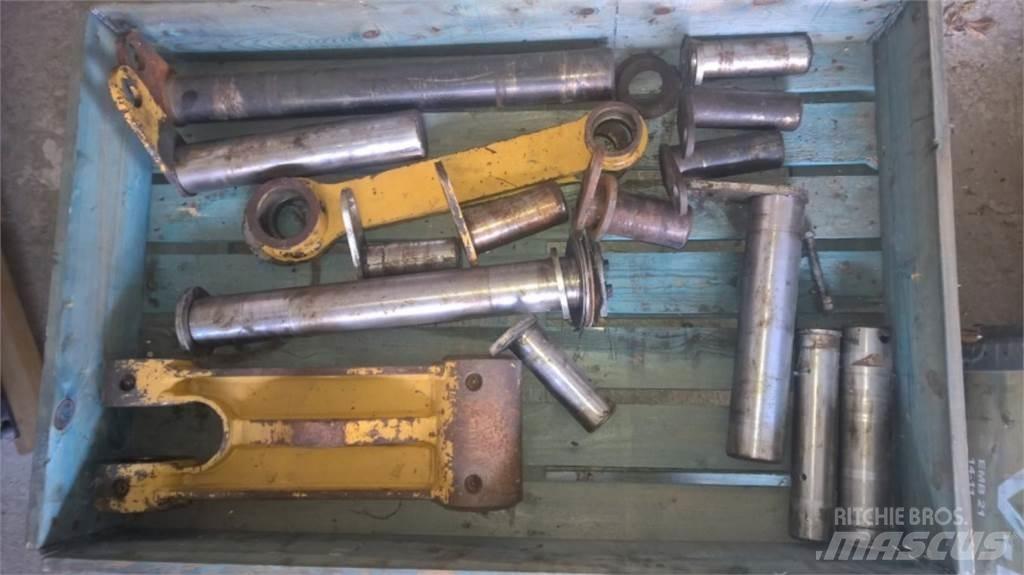 CAT 312D Podvozky a zavesenie kolies