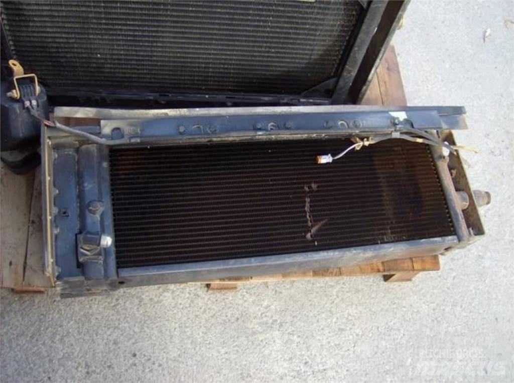 CAT 5080 Pásy, reťaze a podvozok