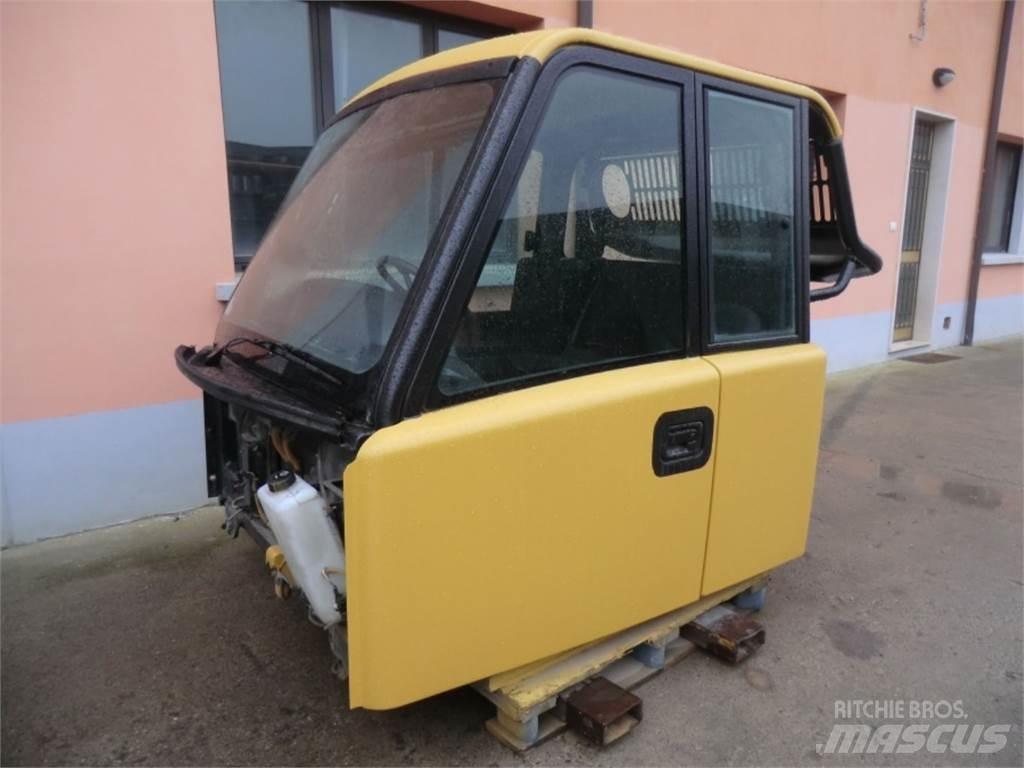 CAT 735 Podvozky a zavesenie kolies