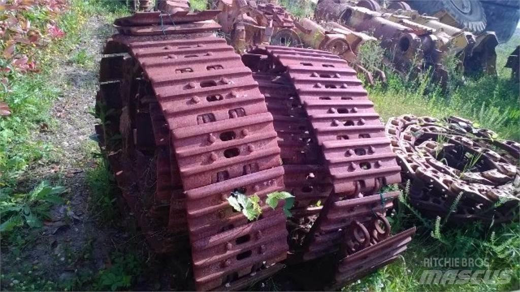 CAT 953 Pásy, reťaze a podvozok