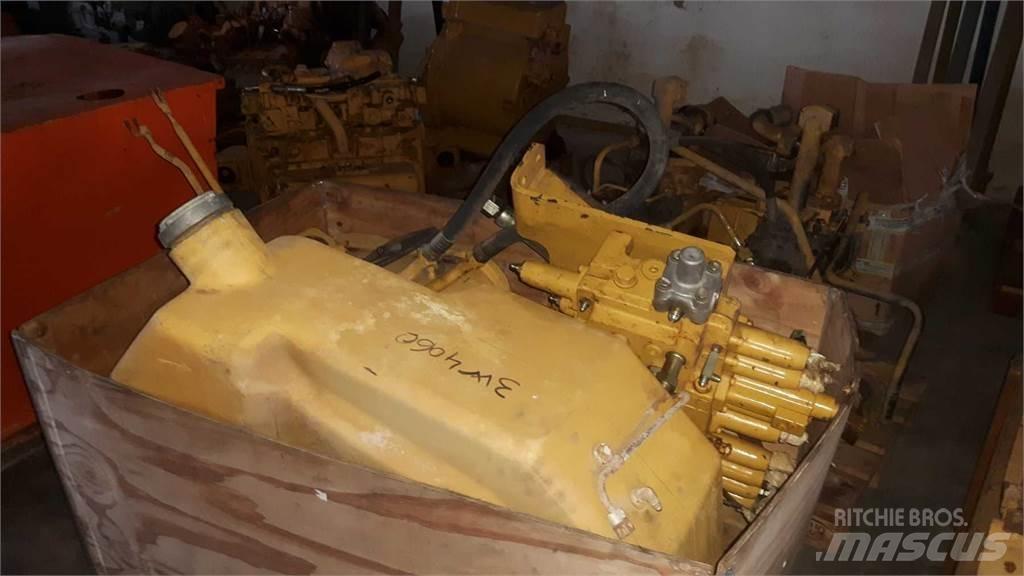 CAT 953 Podvozky a zavesenie kolies
