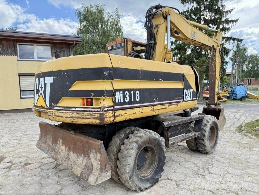 CAT M318 Kolesové rýpadlá