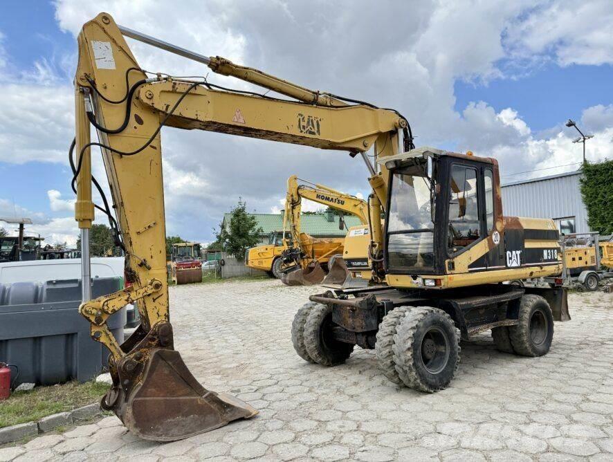 CAT M318 Kolesové rýpadlá