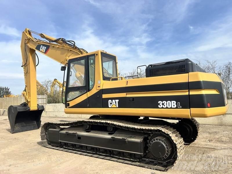 CAT 330. Pásové rýpadlá