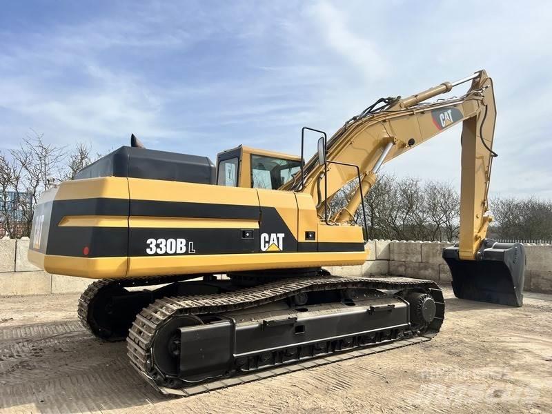 CAT 330. Pásové rýpadlá
