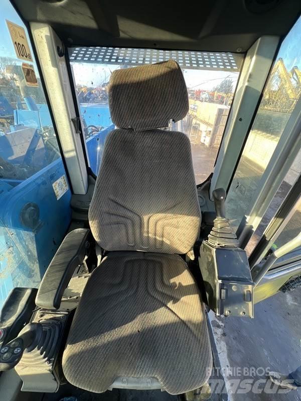 Fuchs MHL 350 Stroje pre manipuláciu s odpadom