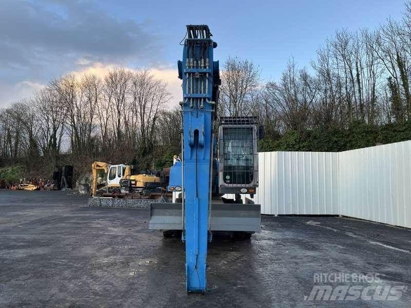 Fuchs MHL320 Stroje pre manipuláciu s odpadom